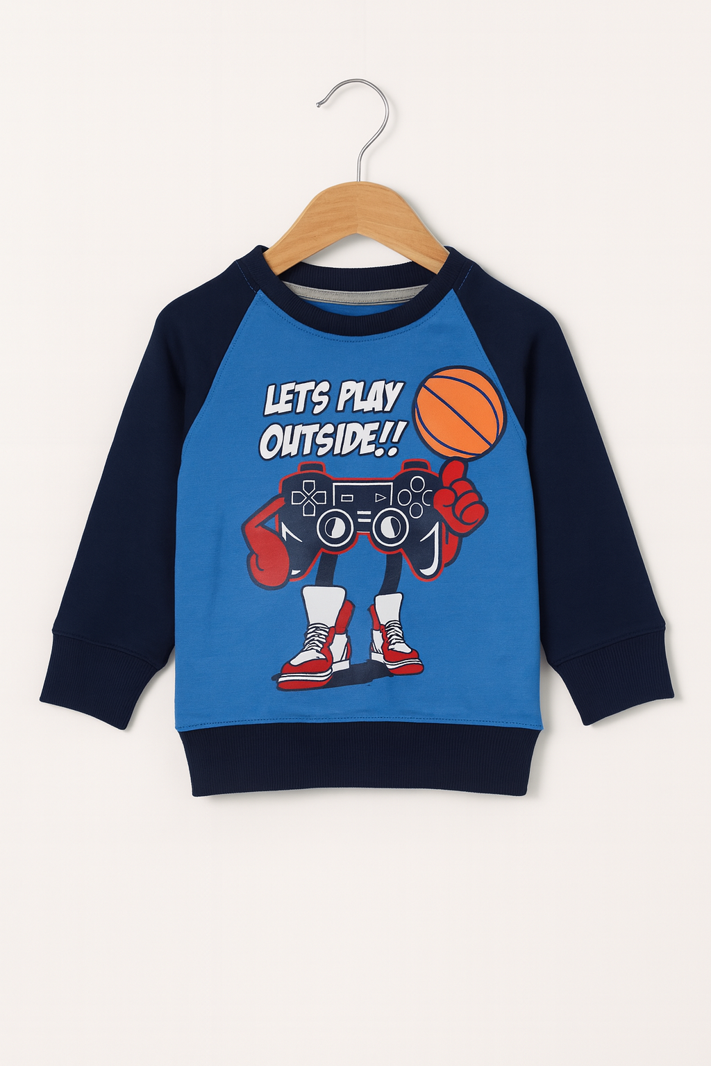 Let’s Play Outside Kids Tracksuit featuring a blue sweatshirt with game controller and basketball graphic.